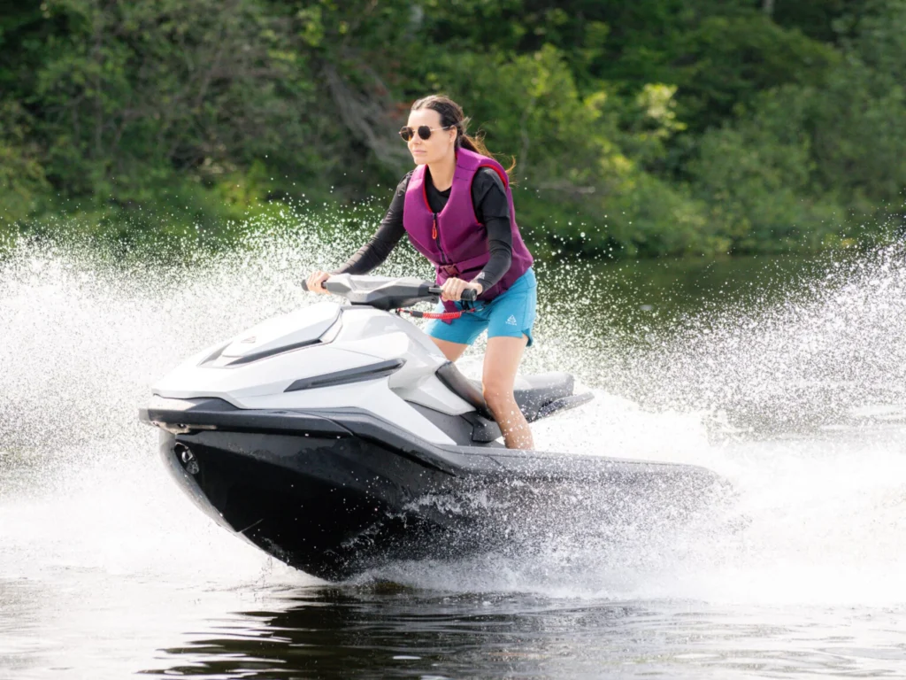 Woman riding the Taiga Orca electric jet ski
