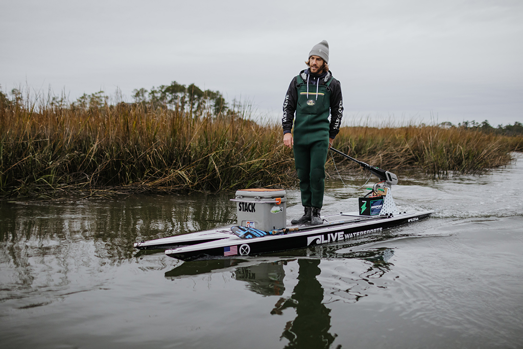 A man using the electric outboards to go flyfishing