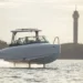 A view of the Candela electric boat cutting across the water